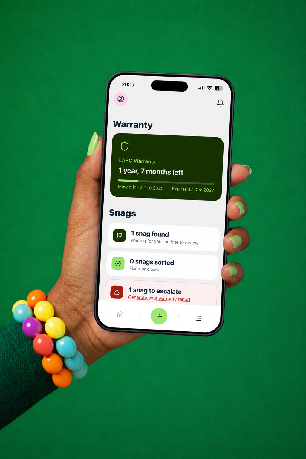 Hand holding phone with SnaggedIt app